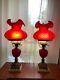 A pair of red fenton lamps, excellent condition, no cracks, or chips