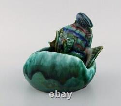 Belgian studio ceramicist. Bowl in glazed ceramics modelled with fish