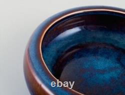 Carl Harry Stålhane for Rörstrand. Ceramic bowl with glaze in blue-brown shades