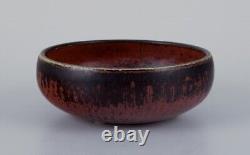 Carl Harry Stålhane for Rörstrand. Ceramic bowl with glaze in brown tones