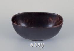 Carl Harry Stålhane for Rörstrand. Small ceramic bowl in dark brown shades