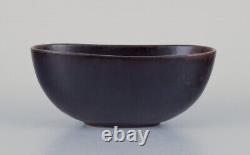 Carl Harry Stålhane for Rörstrand. Small ceramic bowl in dark brown shades