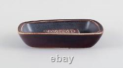 Gunnar Nylund for Rörstrand. Ceramic bowl with glaze in brown tones. Mid-20th C