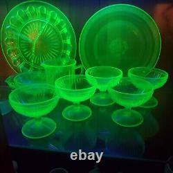 Lot of 25 vintage green vasoline /uranium depression glass