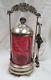 Might be Fenton Cranberry Pickle Caster silver frame / white fern pattern / nice
