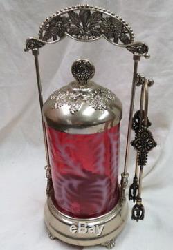 Might be Fenton Cranberry Pickle Caster silver frame / white fern pattern / nice
