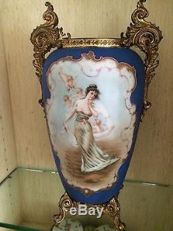 Nakara 17-1/4Blue Vase, Woman in flowing gown surrounded by 4 Angels
