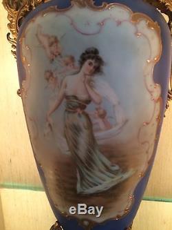Nakara 17-1/4Blue Vase, Woman in flowing gown surrounded by 4 Angels