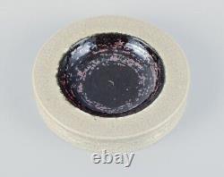 Rörstrand, Sweden, ceramic bowl in cream and black metallic glaze
