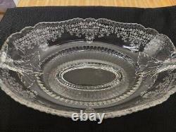 Vtg. Old patterned clear glass ovalesque handled footed fruit bowl