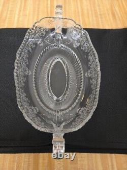 Vtg. Old patterned clear glass ovalesque handled footed fruit bowl